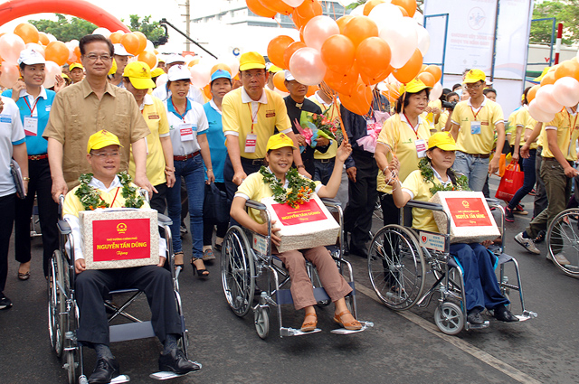 PM joins charity walk with the disabled